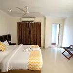 Blossoms Hotel & Service Apartments